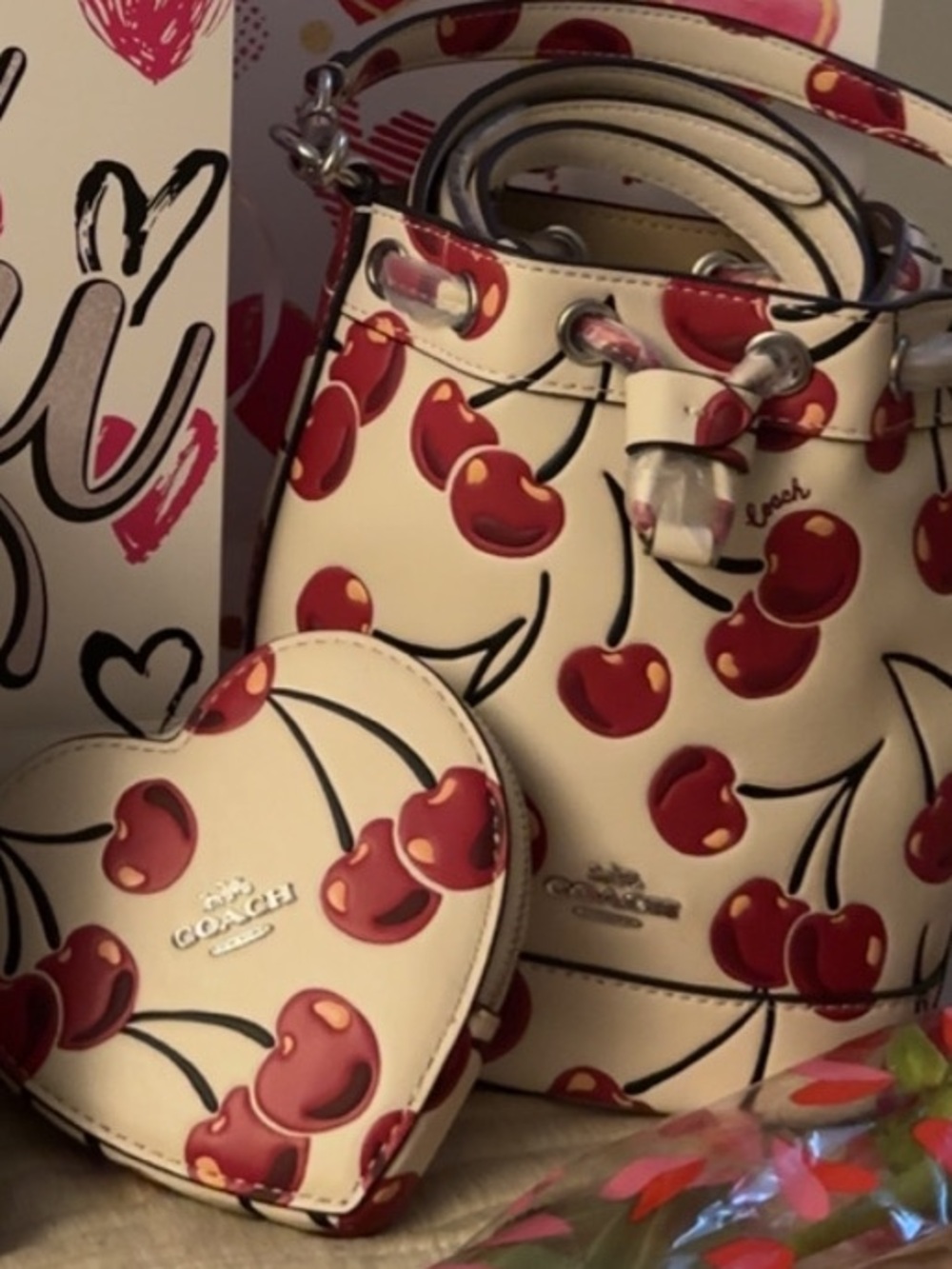 Coach Cream Cherry-Print Bucket Bag with Heart Coin Pouch is a 2 piece set